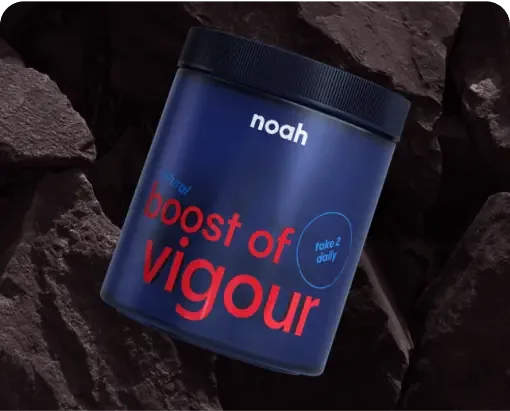A jar of Vigour on dark stones